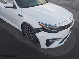 2019 Kia Optima EX with VIN 5XXGU4L14KG302388, listed as a IAAI auction lot 40636313 with 135,095 mi miles. Bid and sale history available at carsss.com. Image 6.