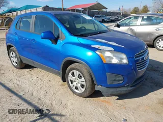 2015 Chevrolet Trax LS with VIN KL7CJKSB4FB086024, listed as a IAAI auction lot 41669572 with 124,312 mi miles. Bid and sale history available at carsss.com. Image 1.