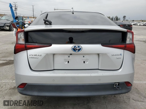 2020 Toyota Prius LE with VIN JTDL9RFU5L3019339, listed as a Copart auction lot 52778255 with 67,797 mi miles and Salvage Title. Bid and sale history available at DreamBid. Image 6.