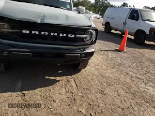 2024 Ford Bronco Outer Banks с VIN 1FMEE8BP8RLA73270, выставлен на аукционе Copart как лот 56790205 с пробегом 8 715 миль миль и Списание • Salvage title. История ставок и продаж доступна на DreamBid. Изображение 14.