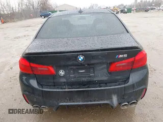 2020 BMW M5 Competition z VIN WBSJF0C00LCD37331, wystawiony jako IAAI lot #41738410 z przebiegiem 49 788 mil mil oraz . Historia ofert i sprzedaży dostępna na DreamBid. Obrazek 16.