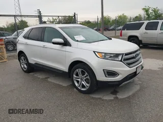 2015 Ford Edge Titanium z VIN 2FMTK4K96FBB61627, wystawiony jako IAAI lot #42197257 z przebiegiem 179 505 mil mil oraz . Historia ofert i sprzedaży dostępna na DreamBid. Obrazek 1.