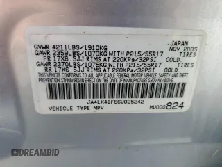 2006 Mitsubishi Outlander SE with VIN JA4LX41F66U025242, listed as a Copart auction lot 77124974 with 163,848 mi miles and Salvage Title. Bid and sale history available at carsss.com. Image 13.