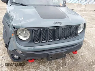 2015 Jeep Renegade Trailhawk z VIN ZACCJBCT4FPB79254, wystawiony jako IAAI lot #41965451 z przebiegiem 87 398 mil mil oraz . Historia ofert i sprzedaży dostępna na DreamBid. Obrazek 17.