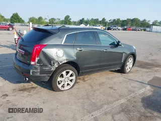 2014 Cadillac SRX Performance Collection with VIN 3GYFNFE35ES663320, listed as a IAAI auction lot 42480235 with 112,406 mi miles and . Bid and sale history available at DreamBid. Image 4.