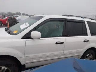 2005 Honda Pilot EX-L z VIN 5FNYF18595B052324, wystawiony jako IAAI lot #42366327 z przebiegiem 153 121 mil mil oraz . Historia ofert i sprzedaży dostępna na DreamBid. Obrazek 14.