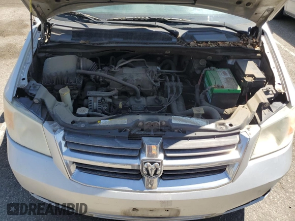 2010 Dodge Grand Caravan SXT z VIN 2D4RN5D13AR331626, wystawiony jako Copart lot #55522315 z przebiegiem 170 202 mil mil oraz Czysty tytuł • Clean title. Historia ofert i sprzedaży dostępna na DreamBid. Obrazek 12.