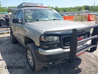2002 GMC Yukon SLT with VIN 1GKEK13Z72R215930, listed as a IAAI auction lot 42024342 with 294,069 mi miles. Bid and sale history available at carsss.com. Image 1.