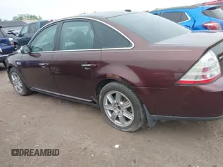2009 Ford Taurus Limited z VIN 1FAHP25W69G100251, wystawiony jako IAAI lot #42289443 z przebiegiem 187 300 mil mil oraz . Historia ofert i sprzedaży dostępna na DreamBid. Obrazek 14.