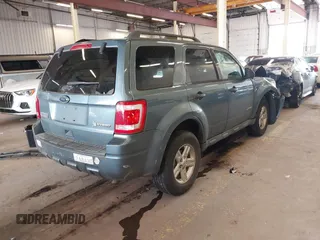 2011 Ford Escape Hybrid with VIN 1FMCU4K31BKC63987, listed as a IAAI auction lot 41987374 with 111,568 mi miles and . Bid and sale history available at DreamBid. Image 4.