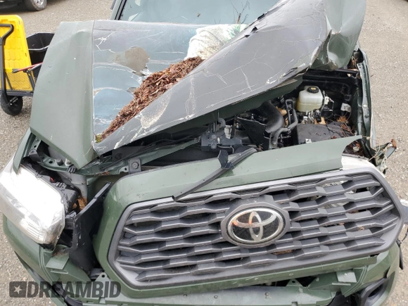 2021 Toyota Tacoma 4WD SR5 with VIN 3TMDZ5BNXMM099474, listed as a Copart auction lot 49325385 with 57,853 mi miles and Salvage Title. Bid and sale history available at carsss.com. Image 11.