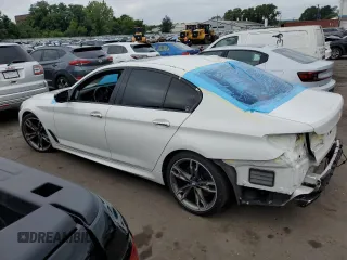 2018 BMW 5 Series M550i xDrive with VIN WBAJB9C5XJB035996, listed as a Copart auction lot 61459425 with Not provided miles and Salvage title. Bid and sale history available at DreamBid. Image 2.