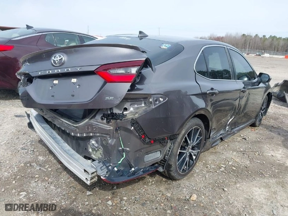 2021 Toyota Camry SE Nightshade with VIN 4T1G11AK0MU586968, listed as a IAAI auction lot 41729108 with 95,686 mi miles. Bid and sale history available at carsss.com. Image 4.