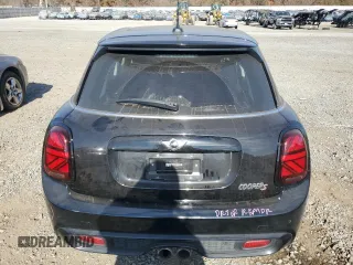2018 MINI Hardtop 4 Door Cooper S with VIN WMWXU3C53J2F50052, listed as a Copart auction lot 77529294 with 105,048 mi miles and Salvage title. Bid and sale history available at DreamBid. Image 6.