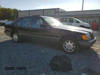 1992 Mercedes-Benz 300 with VIN WDBGB34E8NA061712, listed as a Copart auction lot 55837085 with 219,090 mi miles and Clean Title. Bid and sale history available at DreamBid. Image 4.