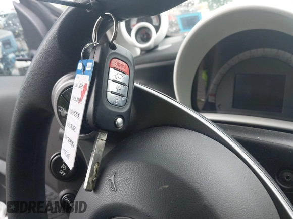 2016 Smart fortwo Passion z VIN WMEFJ5DA3GK055906, wystawiony jako IAAI lot #42274280 z przebiegiem 29 070 mil mil oraz . Historia ofert i sprzedaży dostępna na DreamBid. Obrazek 11.