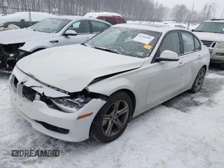 2014 BMW 3 Series 328i with VIN WBA3C1C51EK106435, listed as a IAAI auction lot 41202983 with 142,135 mi miles. Bid and sale history available at carsss.com. Image 2.