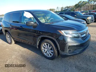 2019 Honda Pilot LX with VIN 5FNYF6H19KB081456, listed as a IAAI auction lot 42012681 with 60,748 mi miles and . Bid and sale history available at DreamBid. Image 1.