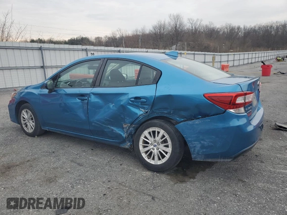 2017 Subaru Impreza Premium with VIN 4S3GKAD62H3606634, listed as a Copart auction lot 51037715 with 100,346 mi miles and Salvage title. Bid and sale history available at DreamBid. Image 2.