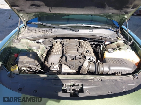 2022 Dodge Charger Scat Pack Widebody with VIN 2C3CDXGJ1NH216763, listed as a IAAI auction lot 41259159 with 32,610 mi miles and . Bid and sale history available at DreamBid. Image 10.