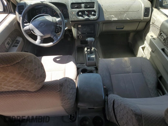 2001 Nissan Xterra XE with VIN 5N1ED28T01C522269, listed as a Copart auction lot 56997515 with 103,800 mi miles and Salvage title. Bid and sale history available at DreamBid. Image 8.