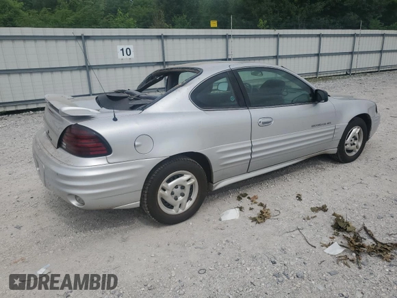 2001 Pontiac Grand Am with VIN 1G2NE12TX1M668035, listed as a Copart auction lot 59700585 with 60,965 mi miles and Salvage title. Bid and sale history available at DreamBid. Image 3.