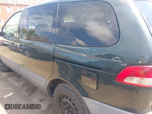 2002 Toyota Sienna LE with VIN 4T3ZF13C32U456123, listed as a IAAI auction lot 42084436 with 242,408 mi miles. Bid and sale history available at carsss.com. Image 6.