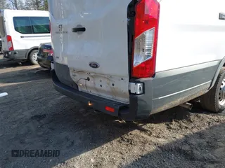 2023 Ford Transit Cargo with VIN 1FTBR3U88PKB01785, listed as a IAAI auction lot 41681093 with 47,672 mi miles and . Bid and sale history available at DreamBid. Image 6.