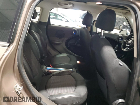 2012 MINI Countryman with VIN WMWZB3C52CWM01672, listed as a Copart auction lot 56064265 with 97,267 mi miles and Salvage Title. Bid and sale history available at DreamBid. Image 10.