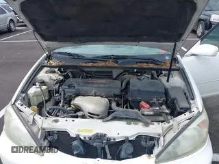 2004 Toyota Camry LE with VIN 4T1BE32K64U277496, listed as a IAAI auction lot 42130199 with 250,972 mi miles. Bid and sale history available at carsss.com. Image 10.