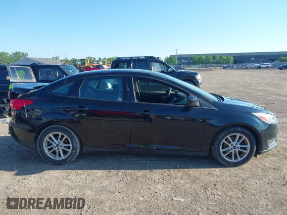 2018 Ford Focus SE with VIN 1FADP3FEXJL286396, listed as a IAAI auction lot 42634912 with 73,769 mi miles and . Bid and sale history available at DreamBid. Image 13.
