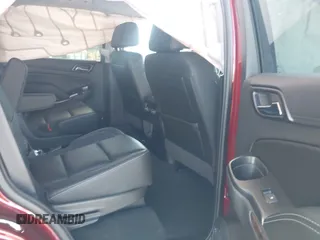 2018 Chevrolet Tahoe LT with VIN 1GNSCBKC5JR385935, listed as a IAAI auction lot 42116288 with 50,890 mi miles and . Bid and sale history available at DreamBid. Image 8.