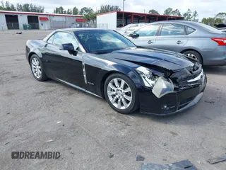 2009 Cadillac XLR Platinum z VIN 1G6YV36A795600670, wystawiony jako IAAI lot #41608413 z przebiegiem 100 495 mil mil oraz . Historia ofert i sprzedaży dostępna na DreamBid. Obrazek 1.