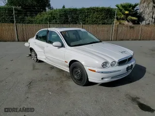 2003 Jaguar X-Type 2.5L Manual with VIN SAJEA51D53XC89023, listed as a Copart auction lot 49325475 with 148,808 mi miles and Salvage Title. Bid and sale history available at carsss.com. Image 10.