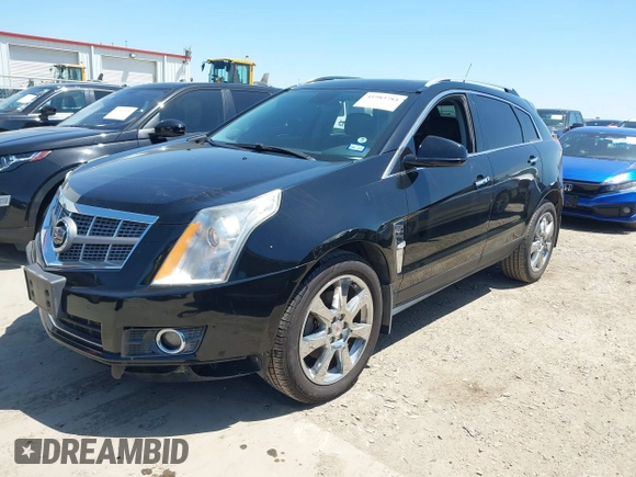 2011 Cadillac SRX Premium Collection z VIN 3GYFNCEY5BS597566, wystawiony jako IAAI lot #41983784 z przebiegiem 102 989 mil mil oraz . Historia ofert i sprzedaży dostępna na DreamBid. Obrazek 2.