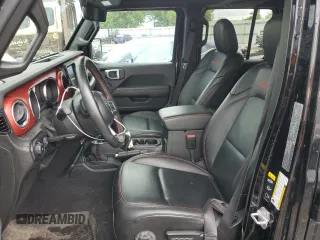 2023 Jeep Wrangler Rubicon с VIN 1C4HJXFN5PW509018, выставлен на аукционе Copart как лот 56535245 с пробегом 34 245 миль миль и Списание • Salvage title. История ставок и продаж доступна на DreamBid. Изображение 7.