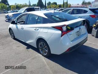 2020 Toyota Prius L Eco with VIN JTDKARFUXL3107211, listed as a IAAI auction lot 42797561 with 328,023 mi miles and . Bid and sale history available at DreamBid. Image 3.