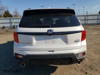 2023 Honda Passport Elite with VIN 5FNYF8H09PB037418, listed as a Copart auction lot 42770504 with 3,852 mi miles. Bid and sale history available at carsss.com. Image 6.