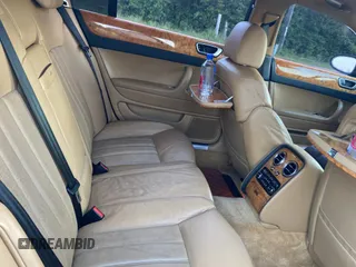 2007 Bentley Flying Spur с VIN SCBBR93W17C042658, выставлен на аукционе Copart как лот 62427535 с пробегом 97 393 миль миль и Списание • Salvage title. История ставок и продаж доступна на DreamBid. Изображение 6.