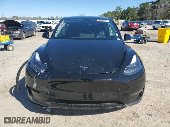 2023 Tesla Model Y Performance with VIN 7SAYGDEF2PF828973, listed as a Copart auction lot 45276585 with 15,750 mi miles and Salvage Title. Bid and sale history available at DreamBid. Image 5.