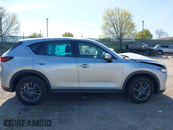2019 Mazda CX-5 Sport with VIN JM3KFBBM7K0668830, listed as a IAAI auction lot 42069505 with Not Provided miles and . Bid and sale history available at DreamBid. Image 12.