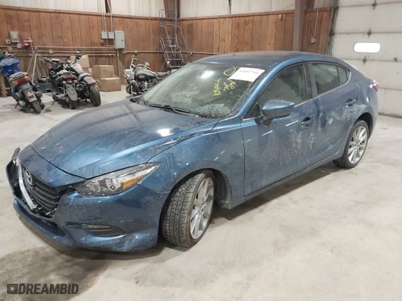 2017 Mazda Mazda3 4-Door Touring with VIN 3MZBN1V77HM113990, listed as a IAAI auction lot 41652766 with 108,065 mi miles. Bid and sale history available at carsss.com. Image 17.