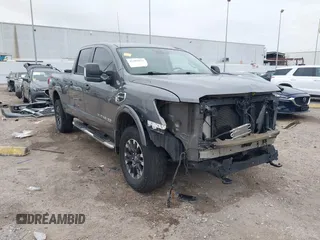 2019 Nissan Titan XD SV with VIN 1N6BA1F44KN509548, listed as a IAAI auction lot 41287079 with 148,028 mi miles. Bid and sale history available at carsss.com. Image 1.