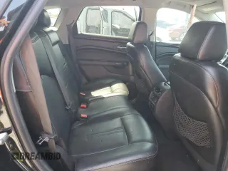 2014 Cadillac SRX Premium Collection with VIN 3GYFNDE35ES591071, listed as a Copart auction lot 57891265 with 134,560 mi miles and Salvage title. Bid and sale history available at DreamBid. Image 11.