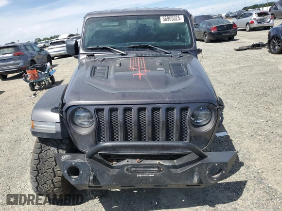 2020 Jeep Wrangler Rubicon z VIN 1C4HJXCG6LW242469, wystawiony jako Copart lot #56965025 z przebiegiem Nie podano mil oraz Szkoda całkowita • Salvage title. Historia ofert i sprzedaży dostępna na DreamBid. Obrazek 5.