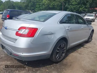 2011 Ford Taurus SE with VIN 1FAHP2DW9BG179423, listed as a IAAI auction lot 39683731 with 297,445 mi miles. Bid and sale history available at carsss.com. Image 4.