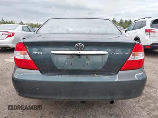 2003 Toyota Camry LE z VIN 4T1BE30K13U746690, wystawiony jako IAAI lot #42220794 z przebiegiem 165 807 mil mil oraz . Historia ofert i sprzedaży dostępna na DreamBid. Obrazek 16.