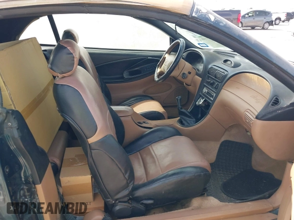 1994 Ford Mustang with VIN 1FALP45TXRF168327, listed as a IAAI auction lot 42237759 with 147,629 mi miles and . Bid and sale history available at DreamBid. Image 5.
