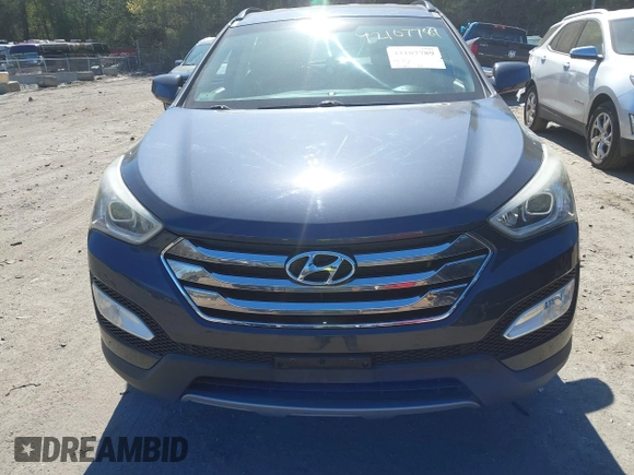 2014 Hyundai Santa Fe z VIN 5XYZUDLB1EG165458, wystawiony jako IAAI lot #42107789 z przebiegiem 94 395 mil mil oraz . Historia ofert i sprzedaży dostępna na DreamBid. Obrazek 12.