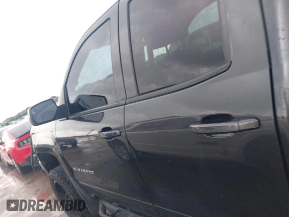 2016 Chevrolet Silverado 1500 LT with VIN 1GCVKREH3GZ233606, listed as a IAAI auction lot 42111728 with 90,449 mi miles and . Bid and sale history available at DreamBid. Image 14.